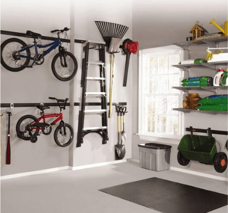A garage with a lot of organization systems and equipment.